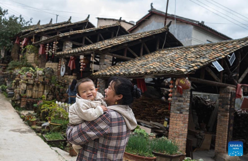 Villagers are pictured near pottery kilns in Liaohu Village of Qujing, southwest China's Yunnan Province, Nov. 5, 2025. Located on the bank of the Nanpan River in the city of Qujing, the Liaohu Village boasts a thousand-year pottery-making tradition. Photo: Xinhua