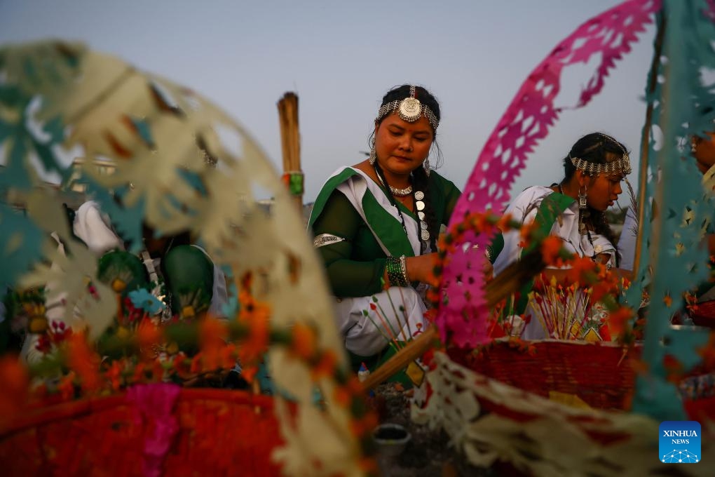 Women in traditional attire take part in the Sama Chakeva Festival in Kathmandu, Nepal, on Nov. 8, 2025. Sama Chakeva, a festival of wishing longevity, health and prosperity between brothers and sisters, was celebrated here on Saturday. (Photo by Sulav Shrestha/Xinhua)