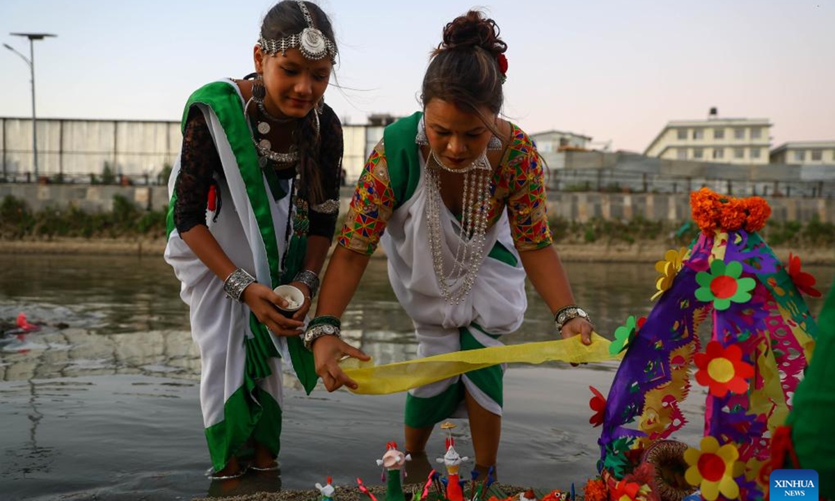 Women in traditional attire take part in the Sama Chakeva Festival in Kathmandu, Nepal, on Nov. 8, 2025. Sama Chakeva, a festival of wishing longevity, health and prosperity between brothers and sisters, was celebrated here on Saturday. (Photo by Sulav Shrestha/Xinhua)