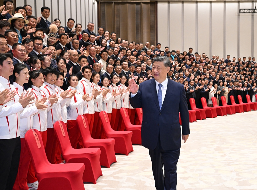 Chinese President Xi Jinping, also general secretary of the Communist Party of China Central Committee and chairman of the Central Military Commission, meets with representatives of national model units and individuals in mass sports and competitive sports in Guangzhou, capital of south China's Guangdong Province, Nov. 9, 2025. (Xinhua/Xie Huanchi)