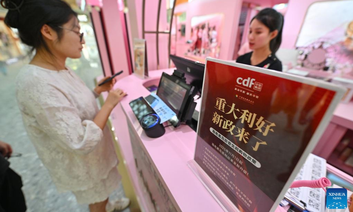 A customer shops at a duty-free shopping mall in Sanya, south China's Hainan Province, Nov. 9, 2025. The Haikou Customs supervised a total of 506 million yuan (about 71 million U.S. dollars) in duty-free sales from approximately 72,900 shoppers during the first week (from Nov. 1 to 7) of the implementation of the expanded offshore duty-free policy. This represents a year-on-year increase of 34.86 percent in sales value, and 3.37 percent in the number of shoppers. (Xinhua/Guo Cheng)