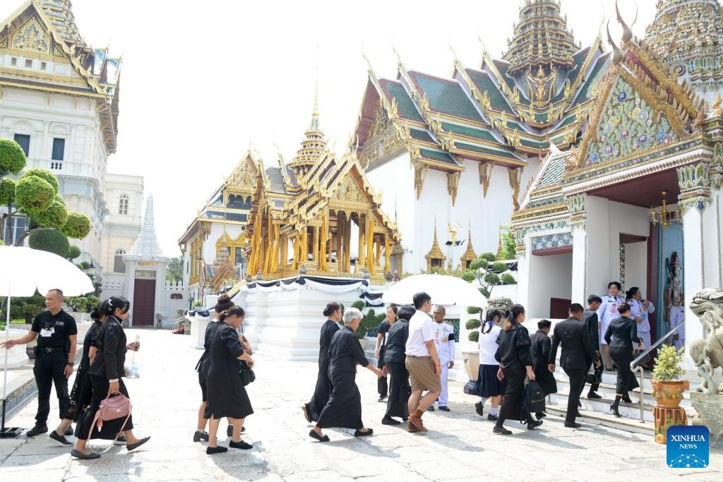 People enter the Grand Palace to mourn for Thailand's Queen Mother Sirikit, who passed away on Oct. 24 at the age of 93, in Bangkok, Thailand, on Nov. 9, 2025. (Xinhua/Rachen Sageamsak)