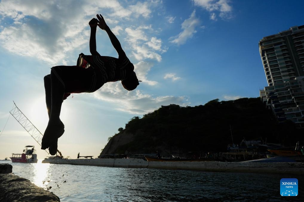 A boy jumps into the sea at a small boat port in Santa Marta, Colombia, Nov. 8, 2025.

The Colombian city of Santa Marta hosts the 4th CELAC (the Community of Latin American and Caribbean States)-EU (European Union) Summit from Nov. 9 to 10. (Photo by Andres Moreno/Xinhua)