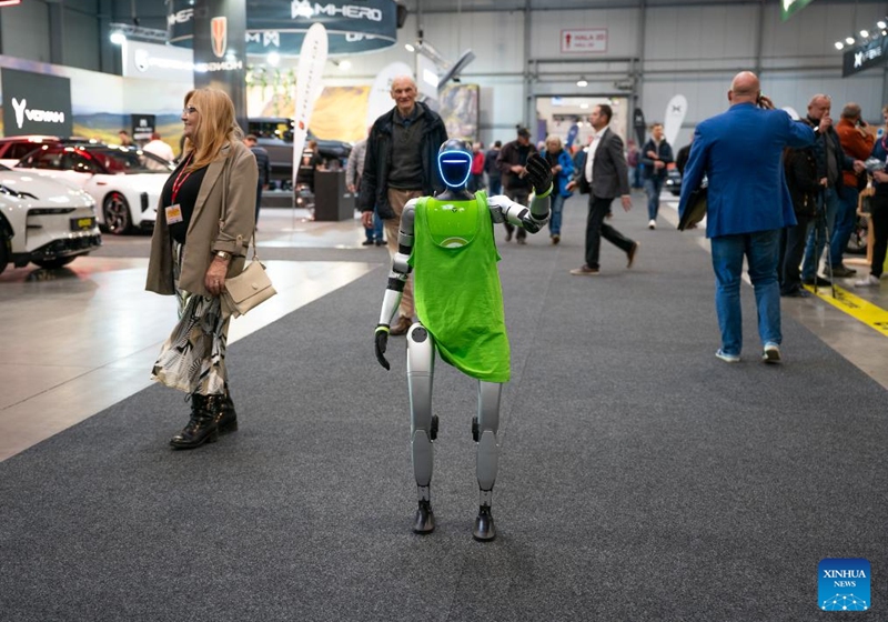 A humanoid robot gestures at the 7th e-SALON in Prague, the Czech Republic, Nov. 14, 2025. The e-SALON, a trade fair for passenger and commercial vehicles with alternative propulsion, opened to public on Friday and will last until Sunday. Photo: Xinhua