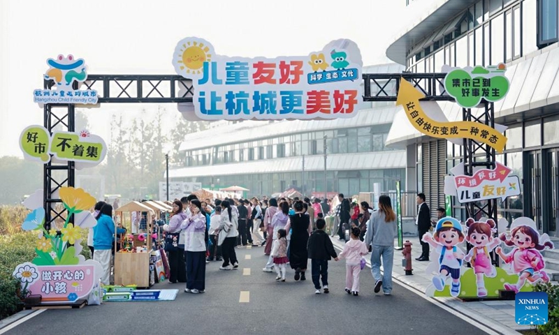 Children and their parents take part in an event of the World Children's Day in Hangzhou, east China's Zhejiang Province, on Nov. 15, 2025. The World Children's Day will fall on Nov. 20 this year. Various activities were held across the country to hail the arrival of the day. Photo: Xinhua