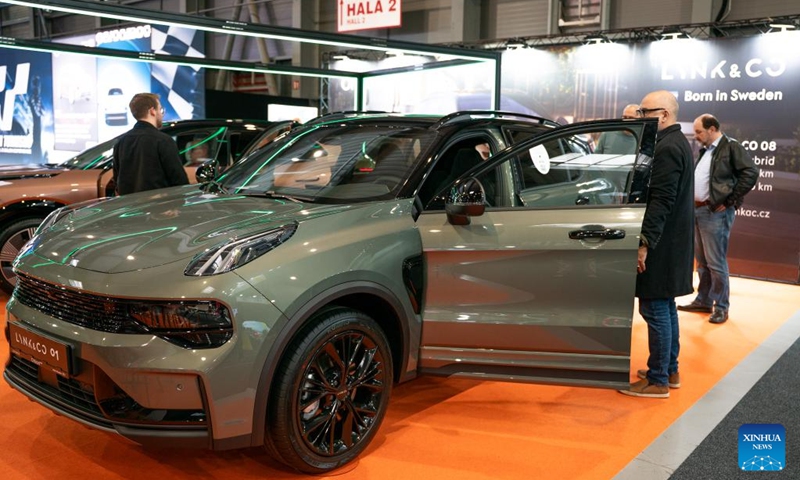 People visit the exhibition area of Lynk & Co at the 7th e-SALON in Prague, the Czech Republic, Nov. 14, 2025. The e-SALON, a trade fair for passenger and commercial vehicles with alternative propulsion, opened to public on Friday and will last until Sunday. Photo: Xinhua