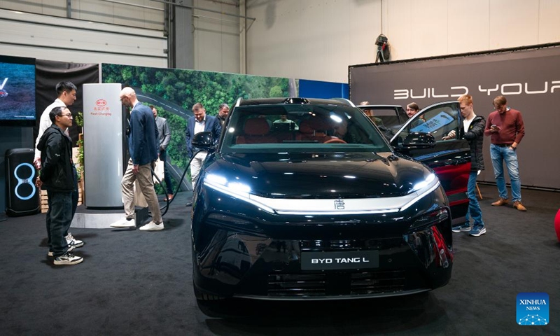 People visit the exhibition area of BYD at the 7th e-SALON in Prague, the Czech Republic, Nov. 14, 2025. The e-SALON, a trade fair for passenger and commercial vehicles with alternative propulsion, opened to public on Friday and will last until Sunday.  Photo: Xinhua