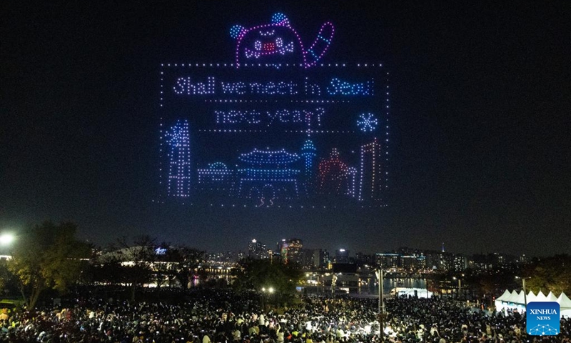 People watch a drone light show at Han River Park in Seoul, South Korea, on Nov. 15, 2025. Photo: Xinhua