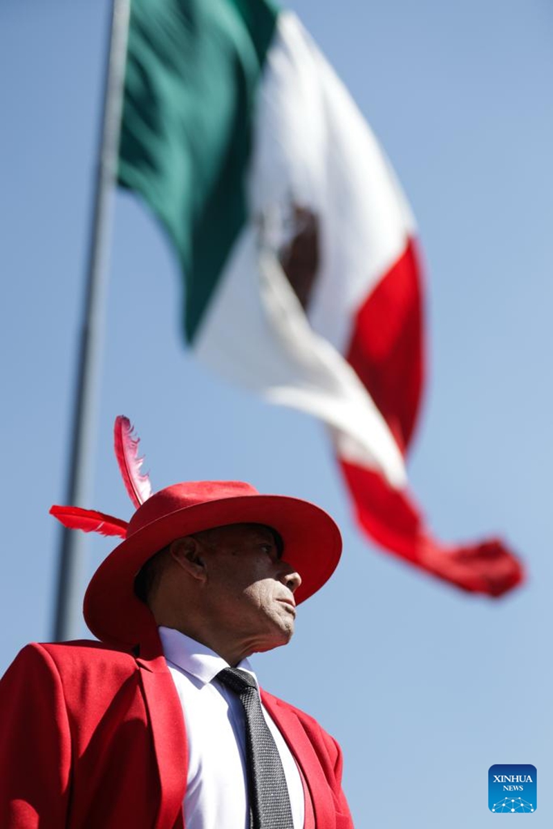 A man attends a public danzon dance event at Zocalo Square in Mexico City, capital of Mexico, on Nov. 16, 2025. (Xinhua/Francisco Canedo)