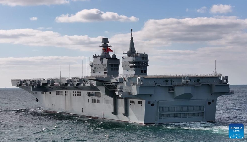 China's first Type 076 amphibious assault ship, the Sichuan, is underway on Nov. 16, 2025. The Sichuan returned to the shipyard in Shanghai at around 5 p.m. Sunday after completing its maiden sea trial. (Photo by Huang Haitao/Xinhua)