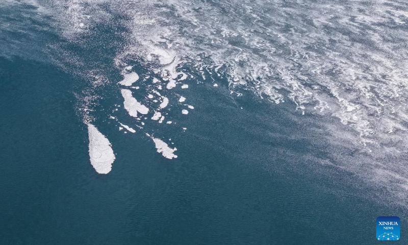 An aerial drone photo taken on Nov. 16, 2025 shows the frozen surface of the Dasugan Lake in Kazak Autonomous County of Aksay, Jiuquan, northwest China's Gansu Province. Dasugan Lake and Xiaosugan Lake are connected and are both formed by the meltwater from the Qilian Mountains. A unique phenomenon is that the upstream Xiaosugan Lake is a freshwater lake, while the downstream Dasugan Lake is a saline lake.

Together, they nurture a vibrant ecological wetland in the vast Gobi Desert, serving as an important stopover and breeding habitat for migratory birds along China's migration routes. Photo: Xinhua