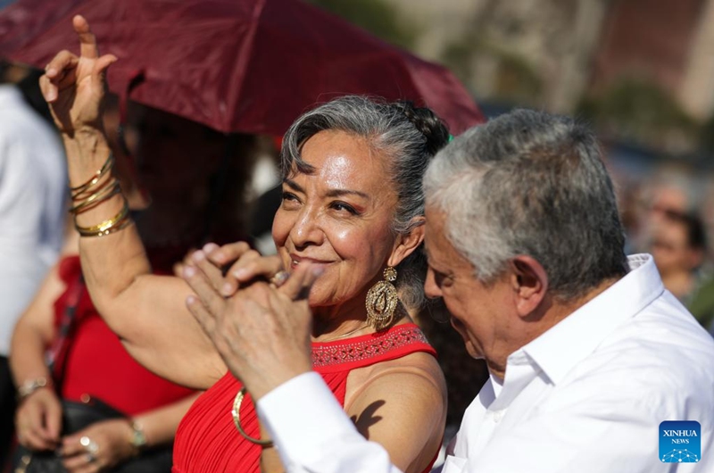 People attend a public danzon dance event at Zocalo Square in Mexico City, capital of Mexico, on Nov. 16, 2025. (Xinhua/Francisco Canedo)