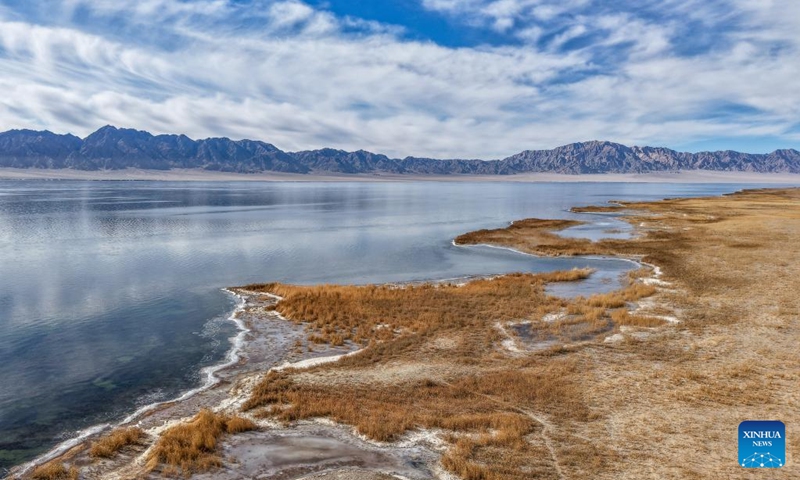 A drone photo taken on Nov. 16, 2025 shows a view of the Dasugan Lake in Kazak Autonomous County of Aksay, Jiuquan, northwest China's Gansu Province. Dasugan Lake and Xiaosugan Lake are connected and are both formed by the meltwater from the Qilian Mountains. A unique phenomenon is that the upstream Xiaosugan Lake is a freshwater lake, while the downstream Dasugan Lake is a saline lake.

Together, they nurture a vibrant ecological wetland in the vast Gobi Desert, serving as an important stopover and breeding habitat for migratory birds along China's migration routes. Photo: Xinhua