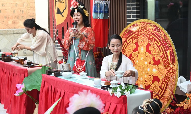 Performers demonstrate a tea ceremony during a cultural event showcasing China's culture of rites and music in Fuzhou, southeast China's Fujian Province, Nov. 15, 2025. The cultural event features a Hanfu fashion show, workshops on intangible cultural heritages, as well as other activities. Photo: Xinhua