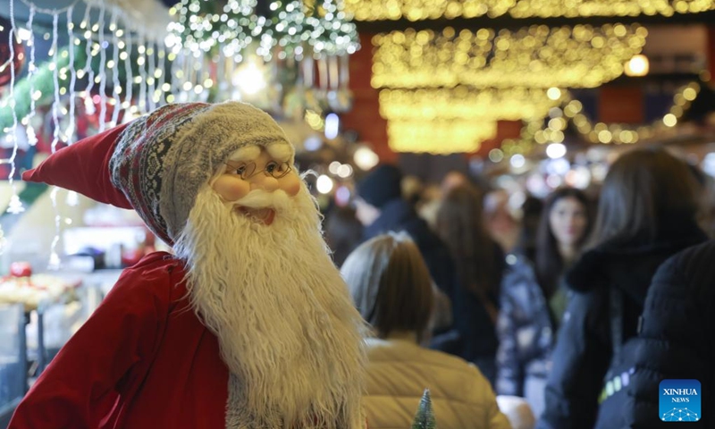 A Santa Claus figurine is seen at a Christmas market in downtown Budapest, Hungary, on Nov. 15, 2025. The market opened here on Friday and will last till Jan. 1, 2026. (Photo by Attila Volgyi/Xinhua)