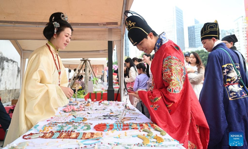 Visitors in traditional costumes attend a cultural event showcasing China's culture of rites and music in Fuzhou, southeast China's Fujian Province, Nov. 15, 2025. The cultural event features a Hanfu fashion show, workshops on intangible cultural heritages, as well as other activities. Photo: Xinhua