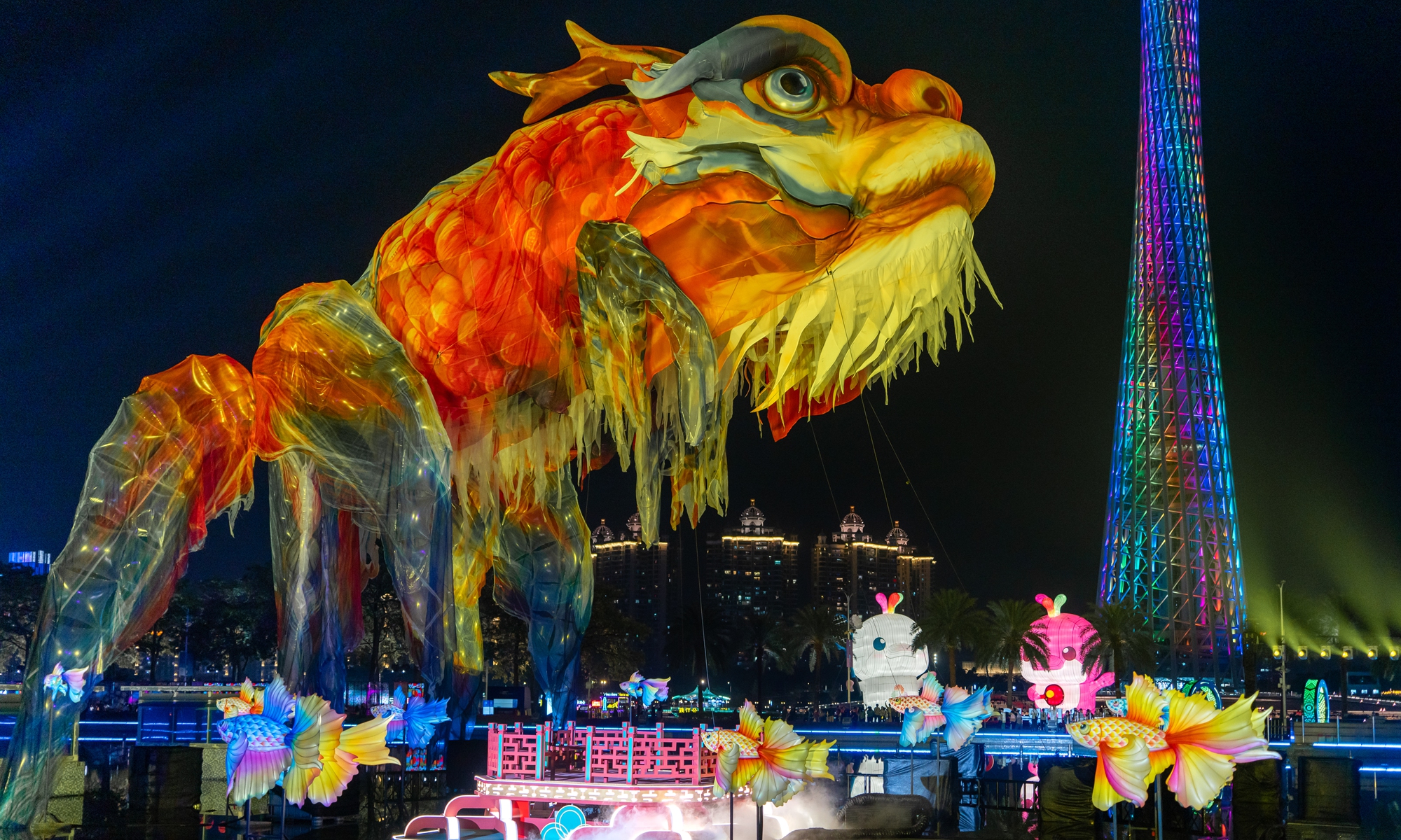 A giant flying Aoyu, a mythical turtle-fish, draws the attention of visitors at the 2025 Guangzhou International Light Festival in Guangzhou, South China's Guangdong Province, on November 16, 2025. This year's light festival innovatively combines elements from the 15th National Games to showcase a number of Games-themed artworks, including the giant flying Aoyu that was featured in the event's opening ceremony. Photo: IC