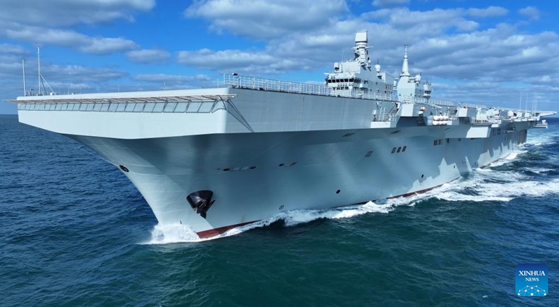 China's first Type 076 amphibious assault ship, the Sichuan, is underway on Nov. 16, 2025. The Sichuan returned to the shipyard in Shanghai at around 5 p.m. Sunday after completing its maiden sea trial.(Photo by Zhang Jiankai/Xinhua)