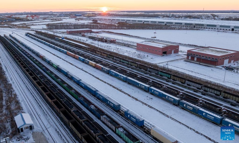 This aerial drone photo taken on Nov. 14, 2025 shows a freight train entering the Tongjiang North Railway Station in Tongjiang City, northeast China's Heilongjiang Province. As an important part of the eastern corridor of the China-Europe freight train service, Tongjiang Railway Port has handled a total of 273 China-Europe freight train trips since it was launched in 2022, with over 14 million tonnes of imported and exported goods, according to data from China Railway Harbin Group Co., Ltd. Photo: Xinhua