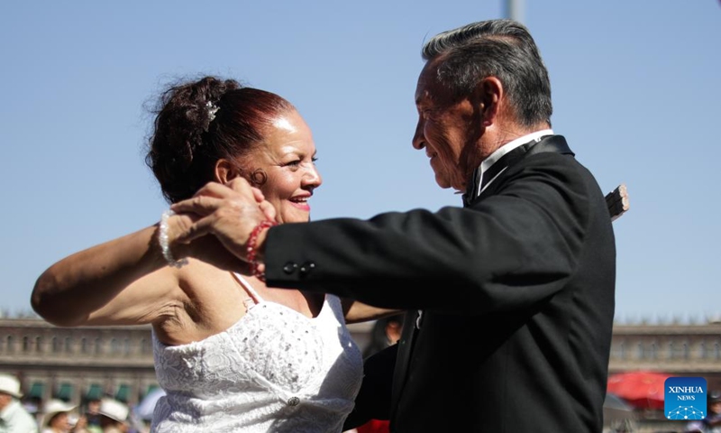 People attend a public danzon dance event at Zocalo Square in Mexico City, capital of Mexico, on Nov. 16, 2025. (Xinhua/Francisco Canedo)