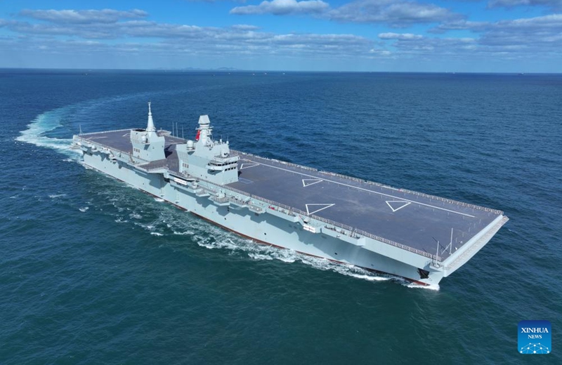China's first Type 076 amphibious assault ship, the Sichuan, is underway on Nov. 15, 2025. The Sichuan returned to the shipyard in Shanghai at around 5 p.m. Sunday after completing its maiden sea trial.(Photo by Zhang Liang/Xinhua)