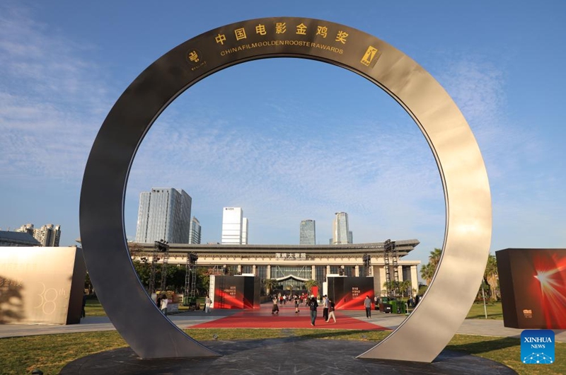 Tourists visit the Dream Avenue of the Golden Rooster and Hundred Flowers in Xiamen, southeast China's Fujian Province, Nov. 16, 2025. The avenue opened to public on Sunday. (Photo by Zeng Demeng/Xinhua)
