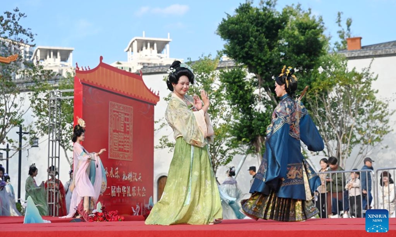 Participants in traditional costumes are seen during a cultural event showcasing China's culture of rites and music in Fuzhou, southeast China's Fujian Province, Nov. 15, 2025. The cultural event features a Hanfu fashion show, workshops on intangible cultural heritages, as well as other activities. Photo: Xinhua
