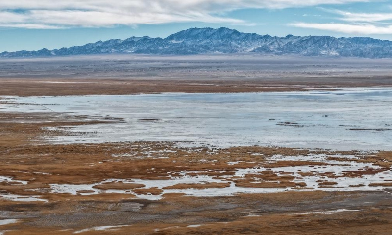 A drone photo taken on Nov. 16, 2025 shows a view of the Dasugan Lake in Kazak Autonomous County of Aksay, Jiuquan, northwest China's Gansu Province. Dasugan Lake and Xiaosugan Lake are connected and are both formed by the meltwater from the Qilian Mountains. A unique phenomenon is that the upstream Xiaosugan Lake is a freshwater lake, while the downstream Dasugan Lake is a saline lake.

Together, they nurture a vibrant ecological wetland in the vast Gobi Desert, serving as an important stopover and breeding habitat for migratory birds along China's migration routes.  Photo: Xinhua