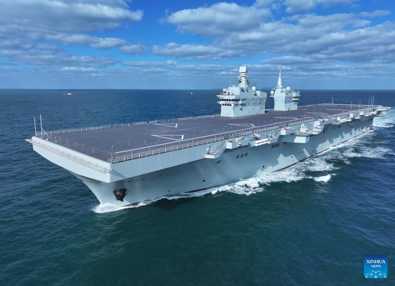 China's first Type 076 amphibious assault ship, the Sichuan, is underway on Nov. 15, 2025. The Sichuan returned to the shipyard in Shanghai at around 5 p.m. Sunday after completing its maiden sea trial. (Photo by Zhang Liang/Xinhua)