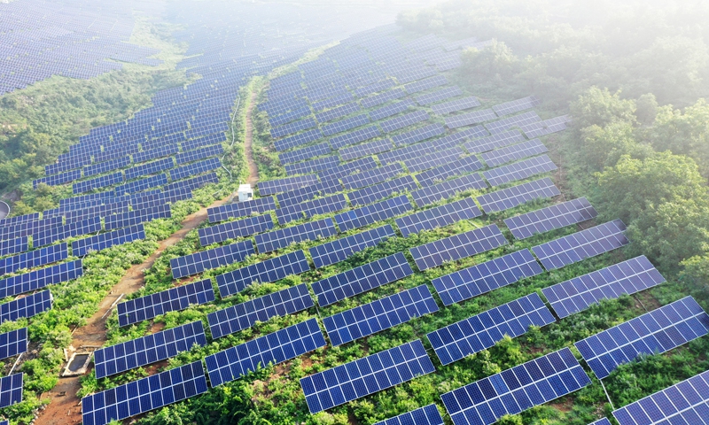 China's solid actions on addressing climate change draw global praise as carbon reduction goals show tangible progress