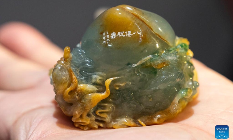 This photo taken on Nov. 21, 2025 shows a jade sculpture at an exhibition held at the Sensory Experience Gallery of the Palace Museum in Beijing, capital of China. Featuring artworks created by disabled artists from Shanghai, the exhibition kicked off here on Friday. Under the guidance of inheritors of intangible cultural heritages, these artists infused their love for life and reverence for culture into their works. Photo: Xinhua