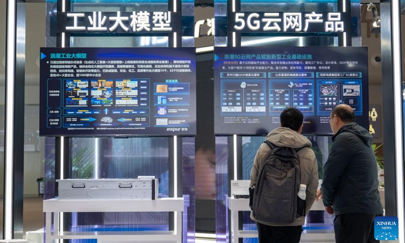 People visit an exhibition hall during the 2025 China 5G + Industrial Internet Conference in Wuhan, central China's Hubei Province, Nov. 21, 2025. The conference kicked off here on Friday and will run through Sunday. Photo: Xinhua
