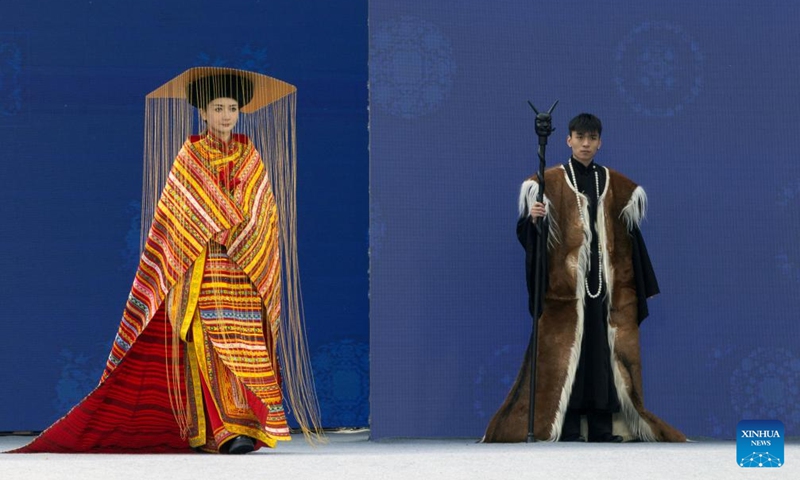 Models present creations at a fashion show held during an event celebrating the Qiang New Year in Wenchuan County, Aba Tibetan and Qiang Autonomous Prefecture, southwest China's Sichuan Province, Nov. 20, 2025. An event celebrating the Qiang New Year was held here from Wednesday to Thursday, featuring a series of activities. (Photo by Lan Hongguang/Xinhua)