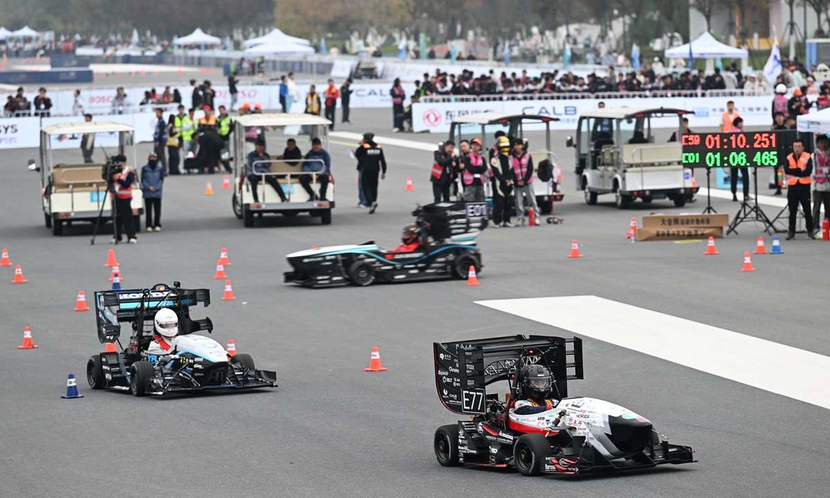 Drivers compete in the Formula Student China 2025 in Hefei, East China's Anhui Province, on November 23, 2025. This year's event attracted over 5,000 teachers and college students from 129 teams representing the Chinese mainland, Hong Kong Special Administrative Region, Turkey, Kazakhstan, and other countries and regions. Photo: VCG