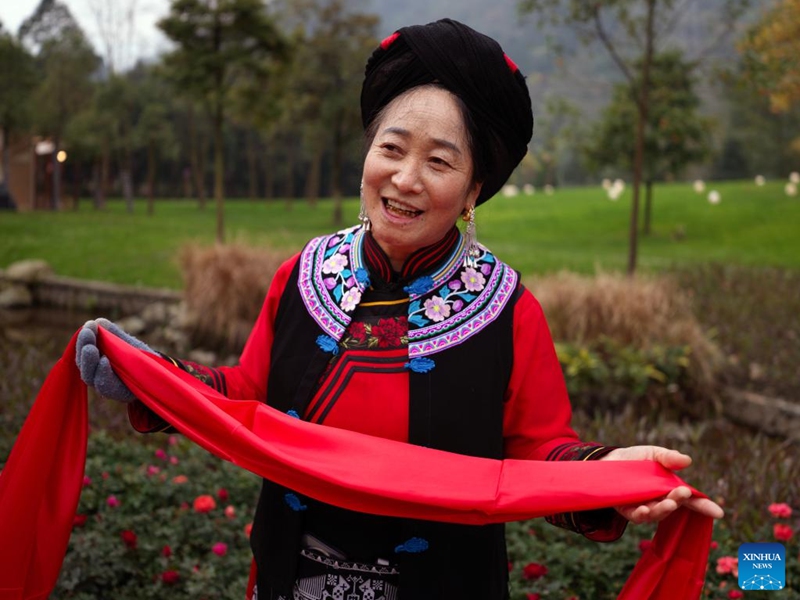 A woman in festive attire attends an event celebrating the Qiang New Year in Wenchuan County, Aba Tibetan and Qiang Autonomous Prefecture, southwest China's Sichuan Province, Nov. 20, 2025. An event celebrating the Qiang New Year was held here from Wednesday to Thursday, featuring a series of activities. (Photo by Lan Hongguang/Xinhua)