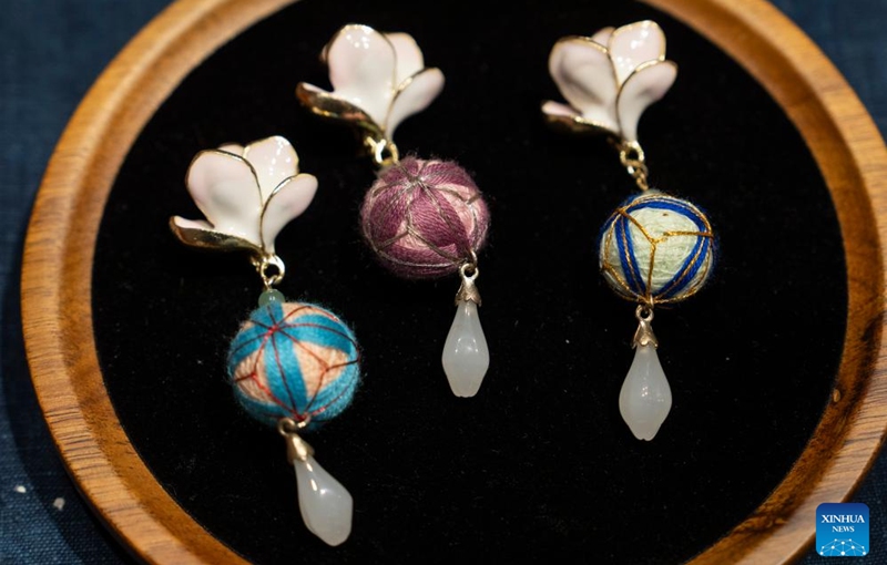 This photo taken on Nov. 21, 2025 shows batik artworks at an exhibition held at the Sensory Experience Gallery of the Palace Museum in Beijing, capital of China. Featuring artworks created by disabled artists from Shanghai, the exhibition kicked off here on Friday. Under the guidance of inheritors of intangible cultural heritages, these artists infused their love for life and reverence for culture into their works. Photo: Xinhua