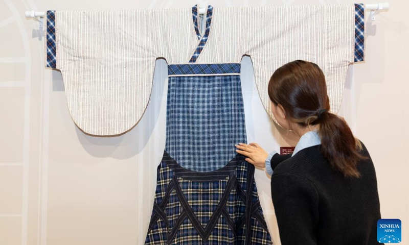 This photo taken on Nov. 21, 2025 shows a homespun Hanfu at an exhibition held at the Sensory Experience Gallery of the Palace Museum in Beijing, capital of China. Featuring artworks created by disabled artists from Shanghai, the exhibition kicked off here on Friday. Under the guidance of inheritors of intangible cultural heritages, these artists infused their love for life and reverence for culture into their works. Photo: Xinhua