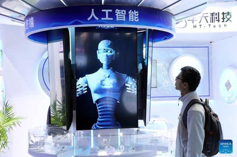 A man visits the 22nd China International Semiconductor Expo in Beijing, capital of China, Nov. 23, 2025. The expo opened here on Sunday. (Xinhua/Pan Xu)