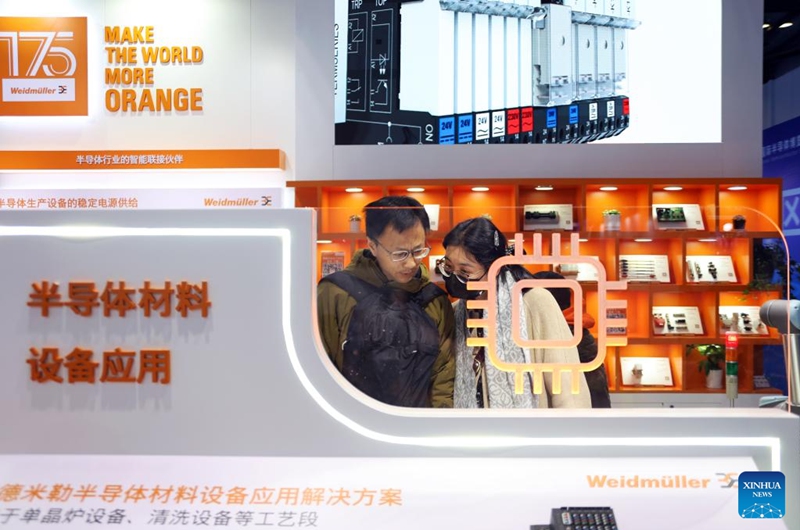 People visit the 22nd China International Semiconductor Expo in Beijing, capital of China, Nov. 23, 2025. The expo opened here on Sunday. (Xinhua/Pan Xu)