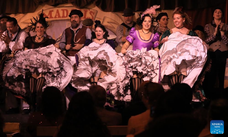 People wearing costumes of the Victorian era attend the Great Dickens Christmas Fair in San Francisco, the United States, Nov. 22, 2025.

The Great Dickens Christmas Fair, which was first held in 1970, opened here on Saturday. Featuring an immersive adventure into Victorian era, the fair transports visitors in a world created by British novelist Charles Dickens in a festive mood. Photo: Xinhua