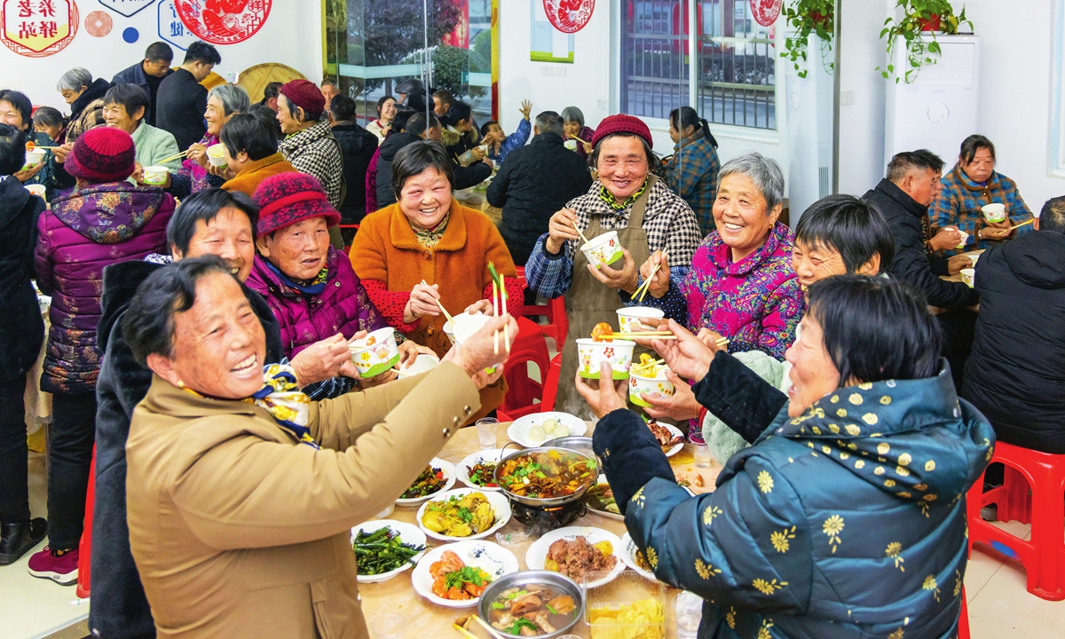 Elderly villagers eat in the canteen of Siyi Village. Photo: Courtesy of China Rural Revitalization magazine