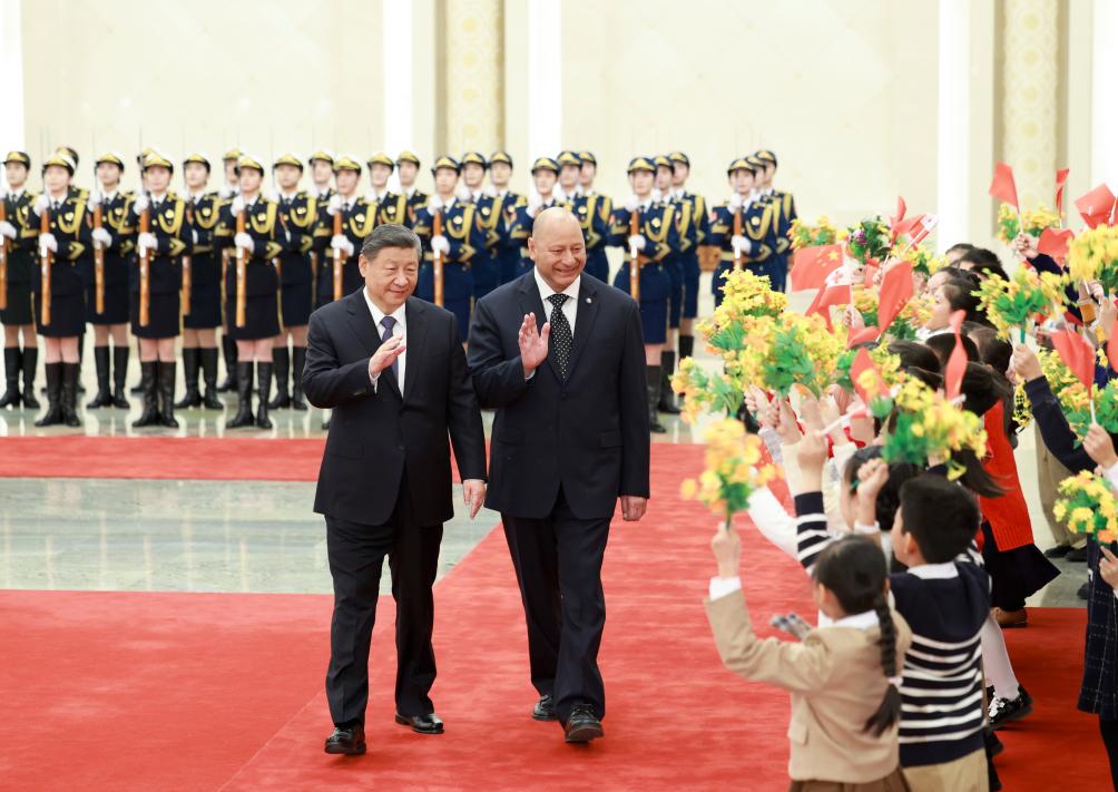Chinese President Xi Jinping holds a welcome ceremony for King Tupou VI of the Kingdom of Tonga in the Northern Hall of the Great Hall of the People prior to their meeting in Beijing, capital of China, Nov. 25, 2025. Xi met with King Tupou VI of the Kingdom of Tonga, who is on a state visit to China, at the Great Hall of the People in Beijing on Tuesday. (Xinhua/Ding Haitao)