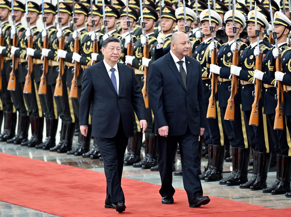 Chinese President Xi Jinping holds a welcome ceremony for King Tupou VI of the Kingdom of Tonga in the Northern Hall of the Great Hall of the People prior to their meeting in Beijing, capital of China, Nov. 25, 2025. Xi met with King Tupou VI of the Kingdom of Tonga, who is on a state visit to China, at the Great Hall of the People in Beijing on Tuesday. (Xinhua/Yin Bogu)