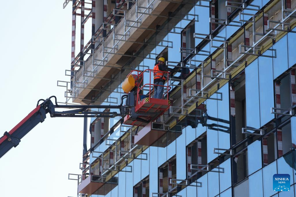 Constructors work at the construction site of the Xinchang College of Zhejiang Industry Polytechnic College in Xinchang County of Shaoxing City, east China's Zhejiang Province, Nov. 26, 2025. Covering approximately 600 mu (about 40 hectares), the Xinchang College of Zhejiang Industry Polytechnic College is the first institution of higher education currently under construction in Xinchang County of Zhejiang. It will accommodate around 6,000 students and faculty members upon completion. (Xinhua/Huang Zongzhi)
