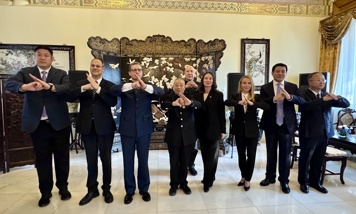 Minister-Counsellor Sergey Kramintsev (second from left), Governor of the Vologda Region Georgy Filimonov? (third from left) and Wu Bin (fourth from left) attend the award ceremony at the Embassy of the Russian Federation on November 22, 2025. Photo: Dong Feng/GT