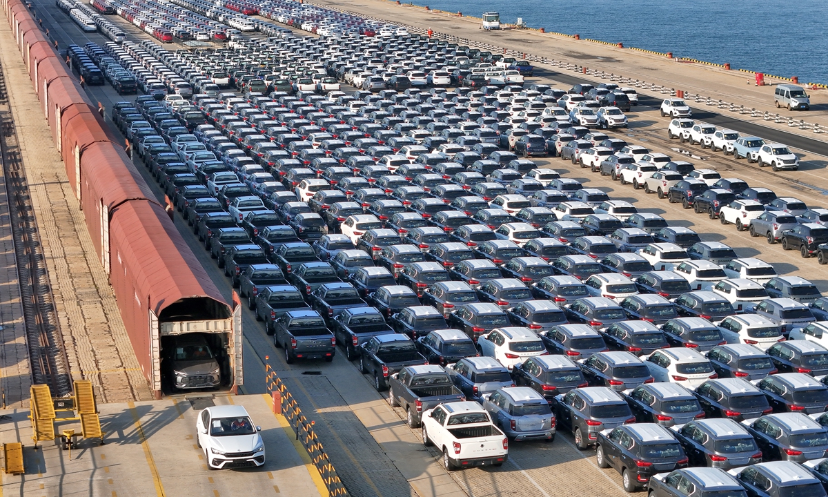 A large number of domestically produced cars gather at Yantai Port in East China's Shandong Province on November 26, 2025, waiting to be loaded onto ships for export. Photo: VCG