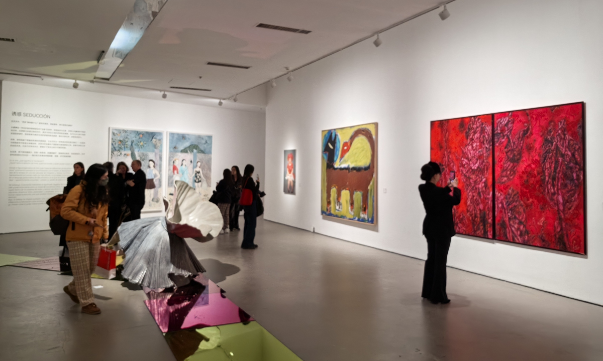 Visitors explore the exhibition in Beijing, on November 21, 2025. Photo: Dong Feng/GT