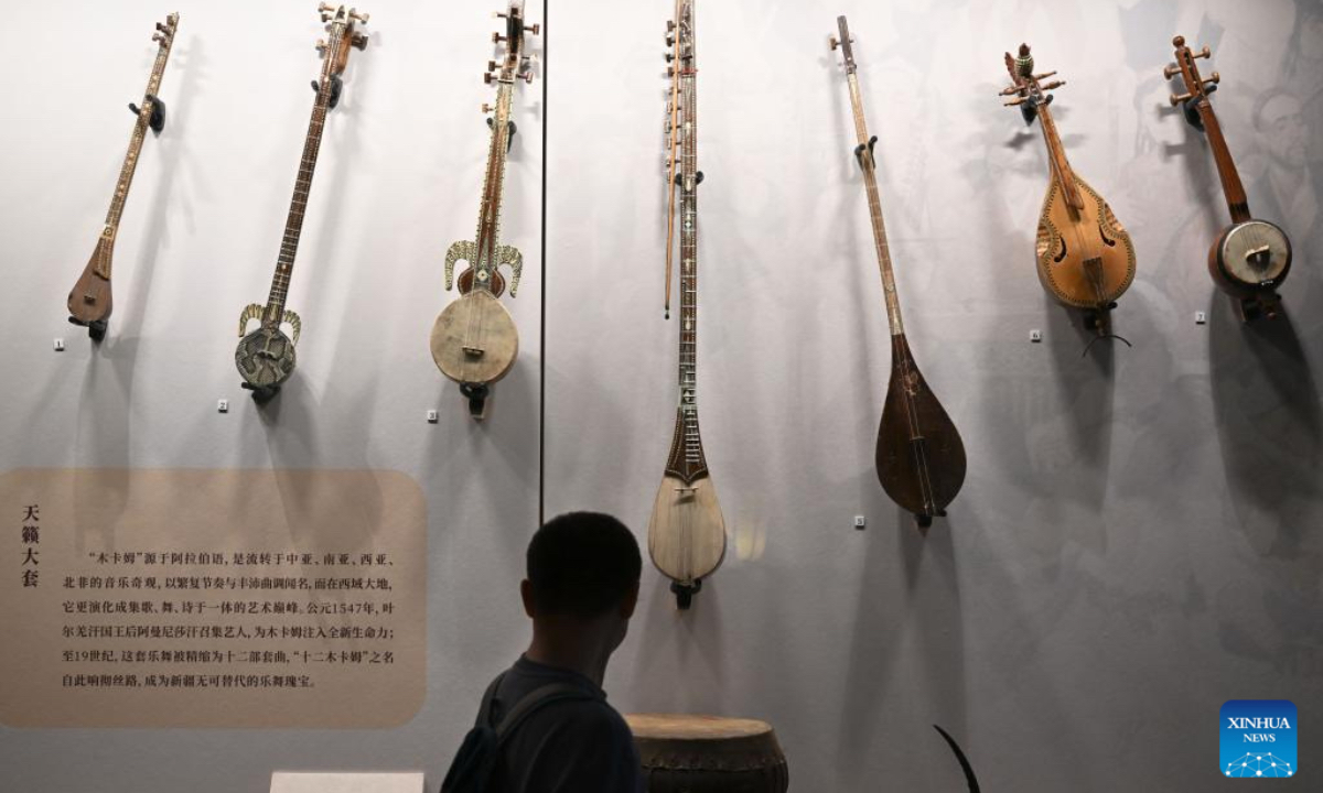 Musical instruments are on display during an exhibition themed on various music cultures along the ancient Silk Road at Guangzhou Maritime Museum in Guangzhou, south China's Guangdong Province, Nov. 29, 2025. The exhibition kicked off here on Saturday, showcasing 143 ancient musical instruments from countries along the Silk Road. The exhibition, which will run until April 6, 2026, presents the historical context and artistic integration of musical instruments in the cultural exchanges between the East and the West. (Xinhua/Deng Hua)