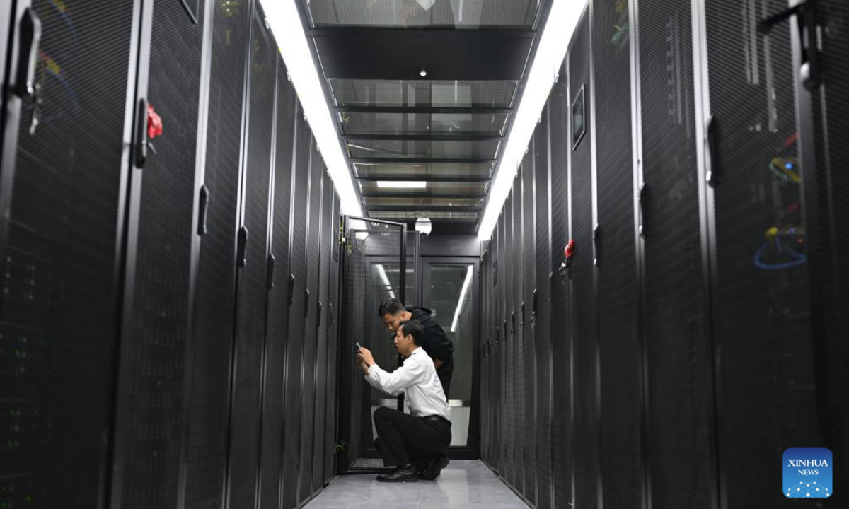 Staff members work at the customs data center of the Haikou Customs in Haikou, south China's Hainan Province, Nov. 27, 2025. China's Hainan Free Trade Port (FTP) will launch island-wide independent customs operations as of Dec. 18, a major milestone in the opening-up drive of the world's second-largest economy despite rising protectionism worldwide. (Xinhua/Guo Cheng)