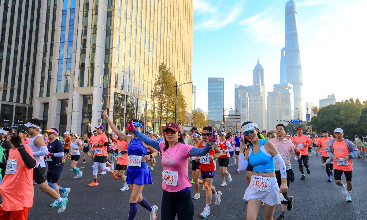 Shanghai Marathon draws 23,000 runners; women's record broken